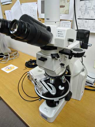 PETROG automated stepping stage and PetrogLit software mounted on a Nikon Eclipse E400 Pol petrographic microscope with a Pixe-Link digital camera. Used for point counting of grains, microfossils or other objects in geological samples and for taking gridded images for mosaics covering large sample areas in thin section. Contact: Randy Corney