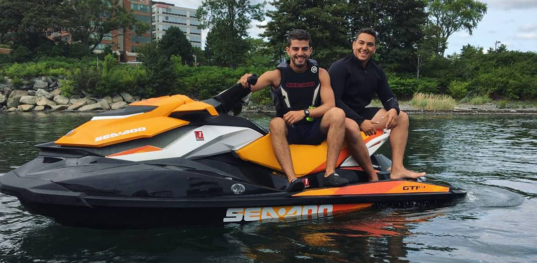 Ossama Nasralla and Omar Hassan on a watercraft.