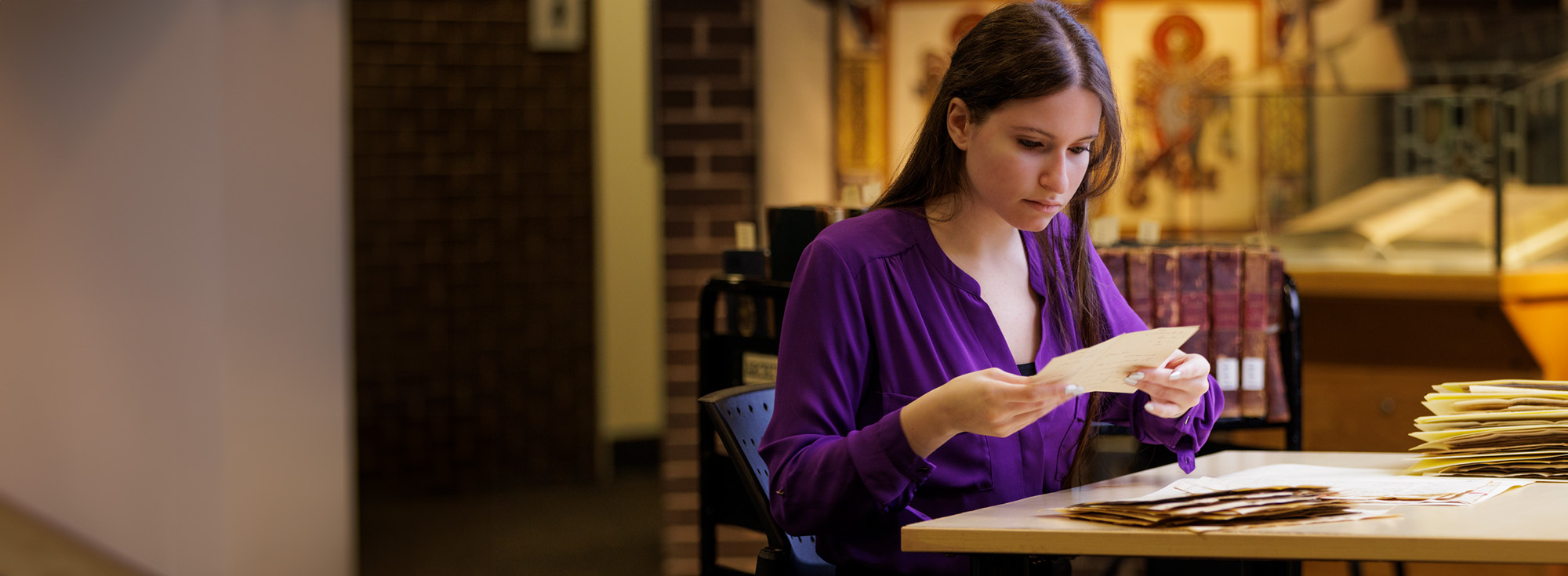 A student examines a document.